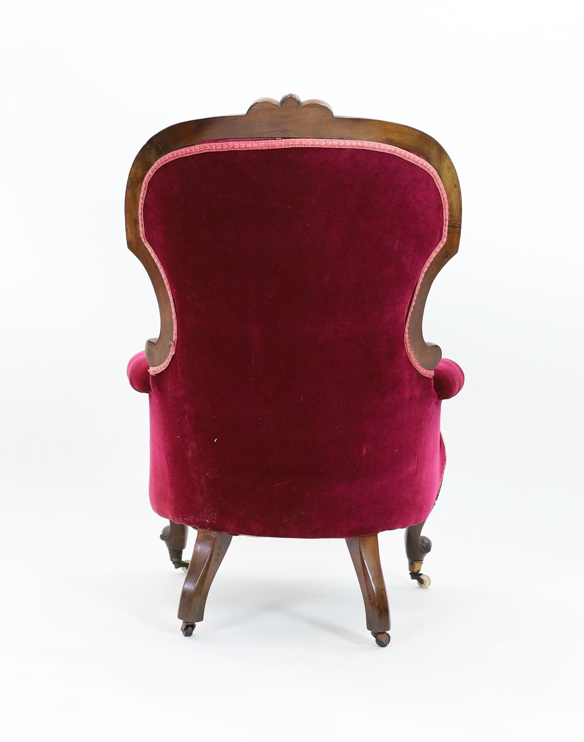 A Victorian walnut upholstered spoonback armchair, width 72cm depth 78cm height 102cm